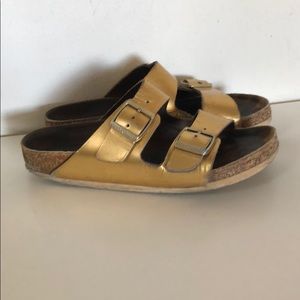Gold Birkenstock’s in worn condition. Size 36